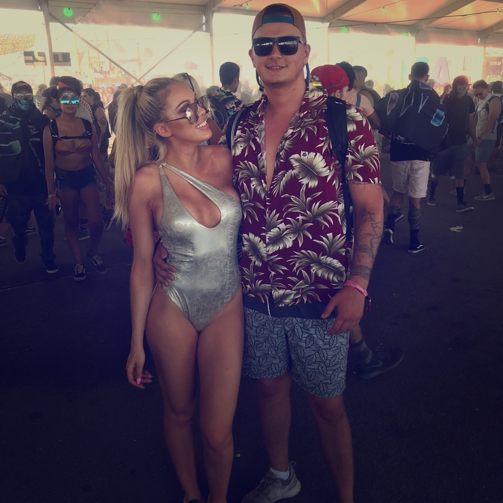 Bodysuit / swimsuit. Comes with original tags